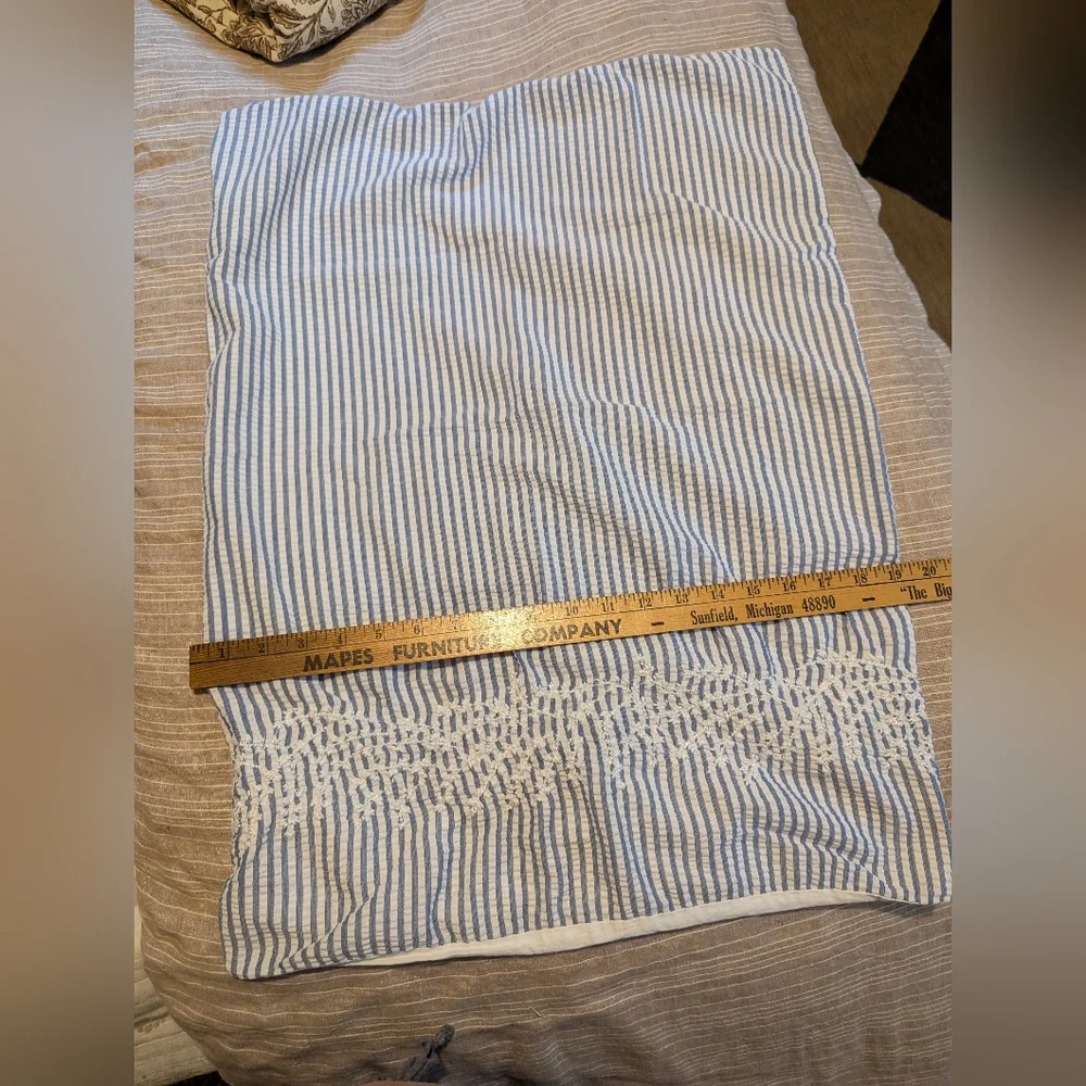 Pair of Nicole Miller embroidered seersucker cotton stripe shams